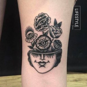 Floral Surrealism Tattoos