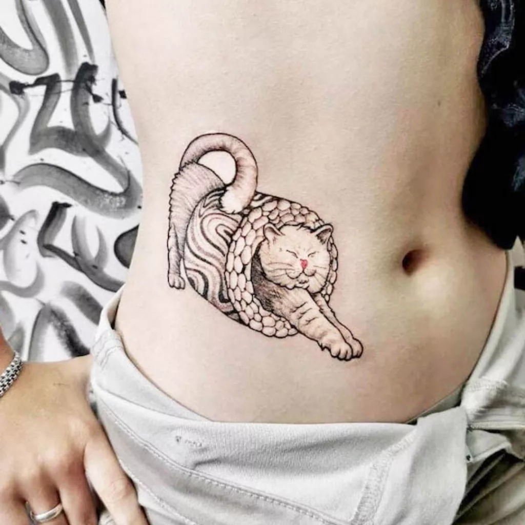 cat tattoo navel