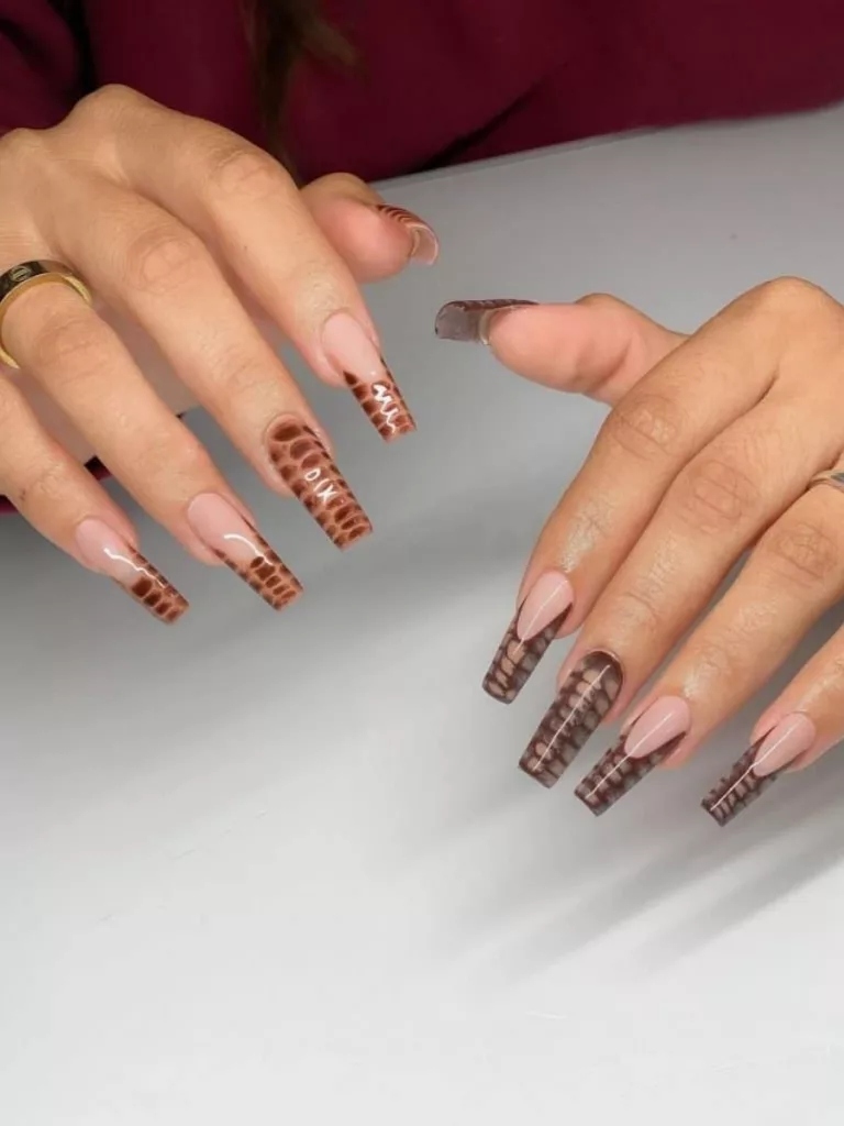 different shades of brown acrylic nails